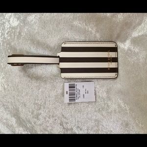 Henri Bendel Brown and White Travel Bag Tag